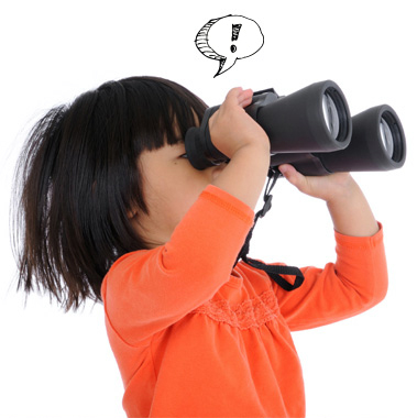 Girl holding up binoculars