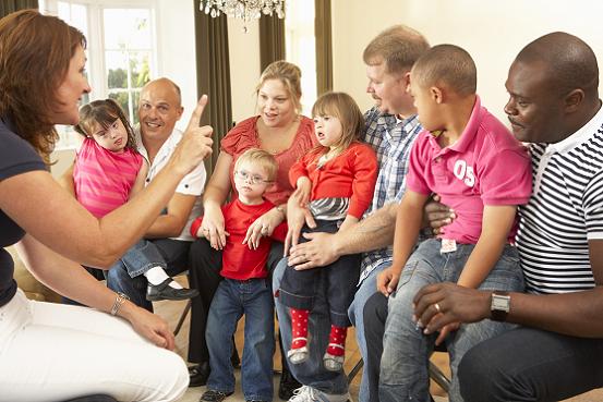 Parents and children at a support group meeting