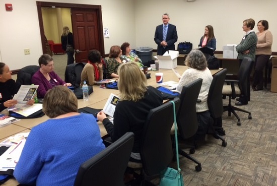 Staff from Illinois health departments are trained to use the OAE screeners.