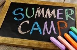 Summer Camp written on chalk board