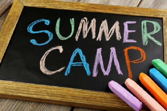 Summer Camp written on chalk board