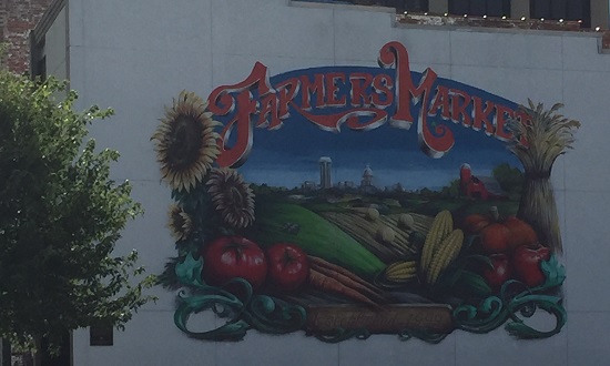 building mural with vegetables and words farmers market