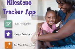 Mother holding child in her lap with information about CDC's free Milestone Tracker App