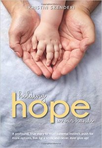 Book cover for "Holding Hope in our Hands"