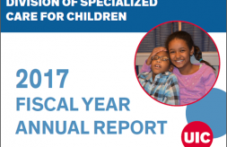 The FY 2017 UIC Division of Specialized Care for Children Annual Report cover features a photo of an African American boy sitting and smiling with his big sister holding him closely next to her.