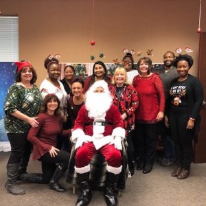 DSCC's Mokena Regional Office staff pose with Santa