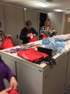 DSCC's Rockford RO staff fill backpacks with items for family caregivers. 