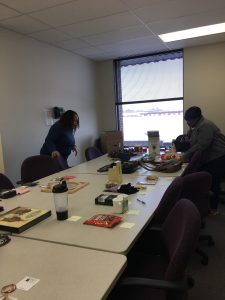 DSCC's Lombard Regional Office staff look at silent auction items