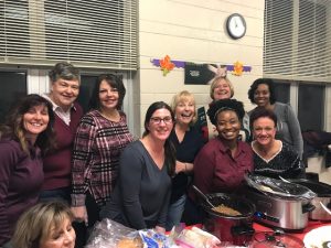 DSCC's Mokena RO staff prepare dinner at a homeless shelter