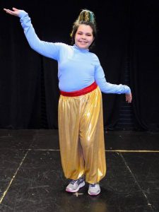 Izzy Gonzalez dressed as the Genie during the musical Aladdin, Jr.