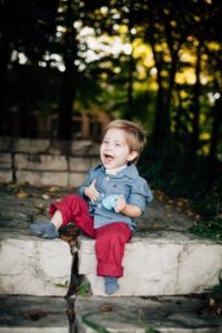 DSCC participant Jakob Kojro-Badziak laughs while sitting outside