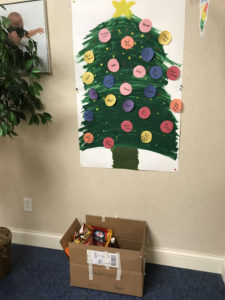 Peoria's giving tree and donation box.