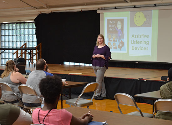 An instructor giving a presentation to parents at the 2019 Institute for Parents of Preschool Children Who Are Deaf or Hard of Hearing