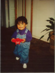 Former DSCC participant and current employee Lisette Rios smiles as a toddler. 