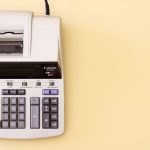 printing calculator on a yellow background