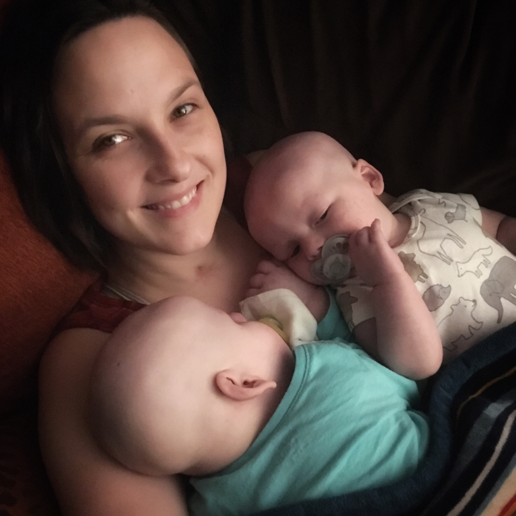Erica Stearns holds her two children, Margot and Caratacus, while they were babies