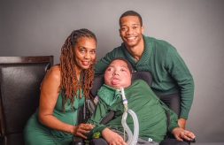Portrait of DSCC participant Malachi Chapman alongside his mother, Dena, and his brother, Josh