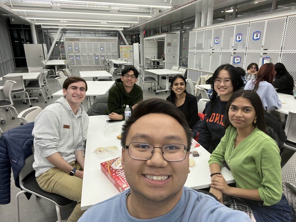 A team of six students from UIUC's MedLaunch organization pose for a group photo in their breakroom.